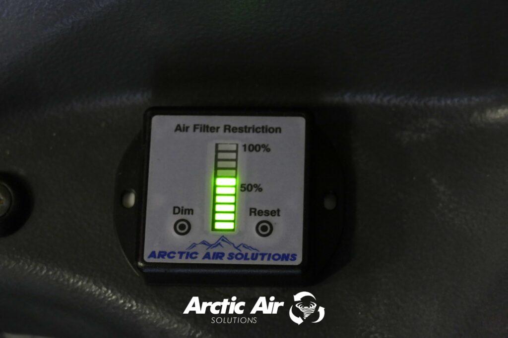 Air filter restriction gauge just above 50%.